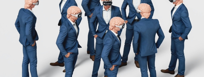 Figurines d'hommes d'affaires portant chacun un Apple Vision pro